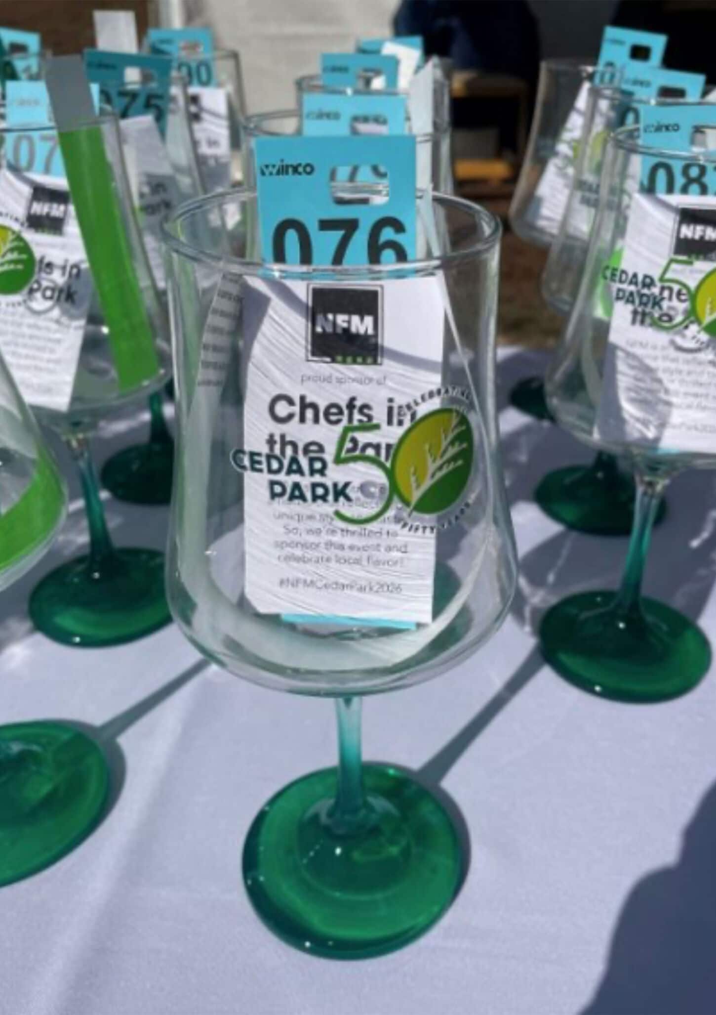 Chef in the Park event displaying the glasses and tickets for the event