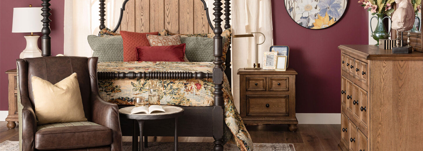 Timeless Heritage bedroom scene with bed, chair, dresser, and nightstand.