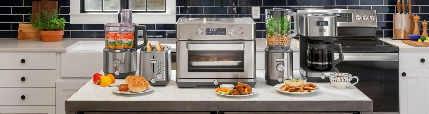 kitchen island with multiple kitchen small appliances on top