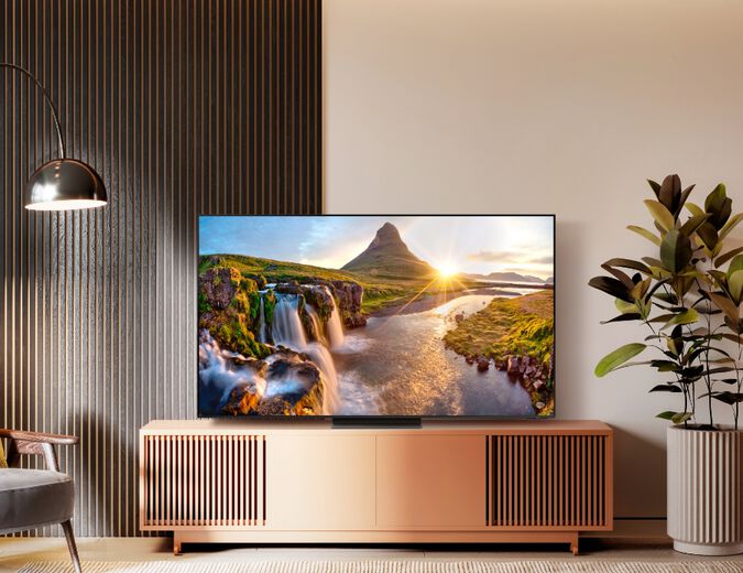 Samsung TV on tv stand in living room