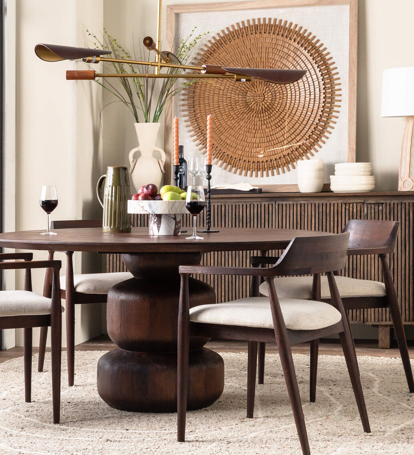deep chocolate colored wooden dining set with off-white colored upholstered seats