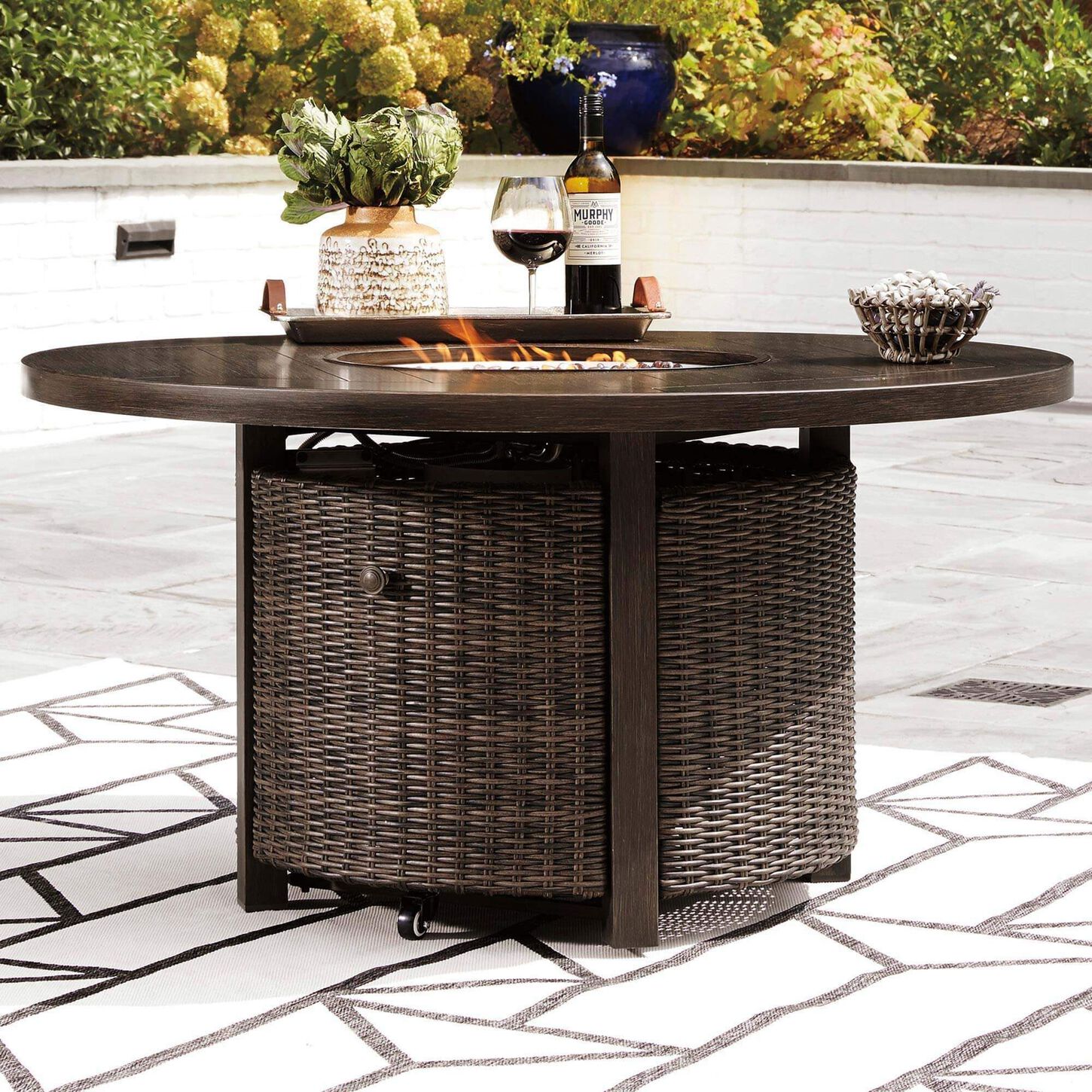 Ashley Paradise Trail Round Fire Pit Table in Medium Brown