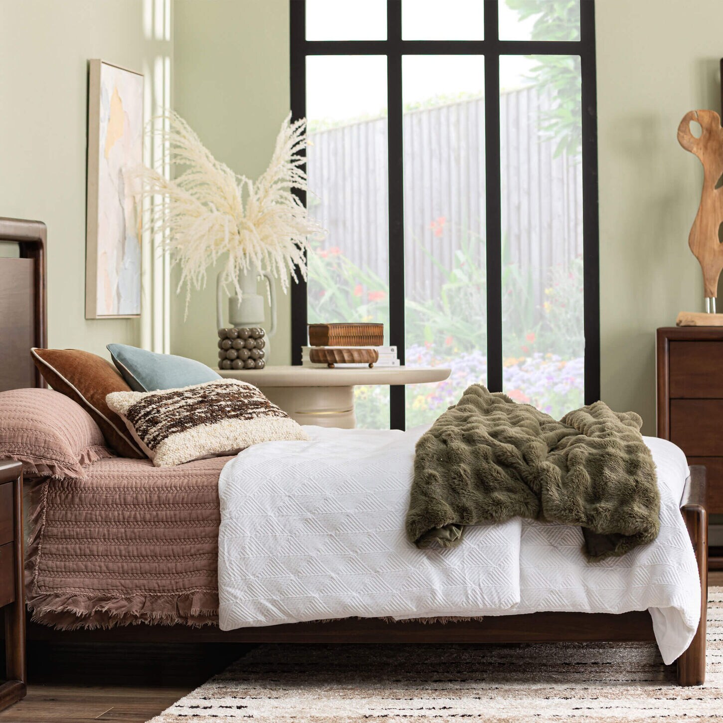 Bed with blankets and throws