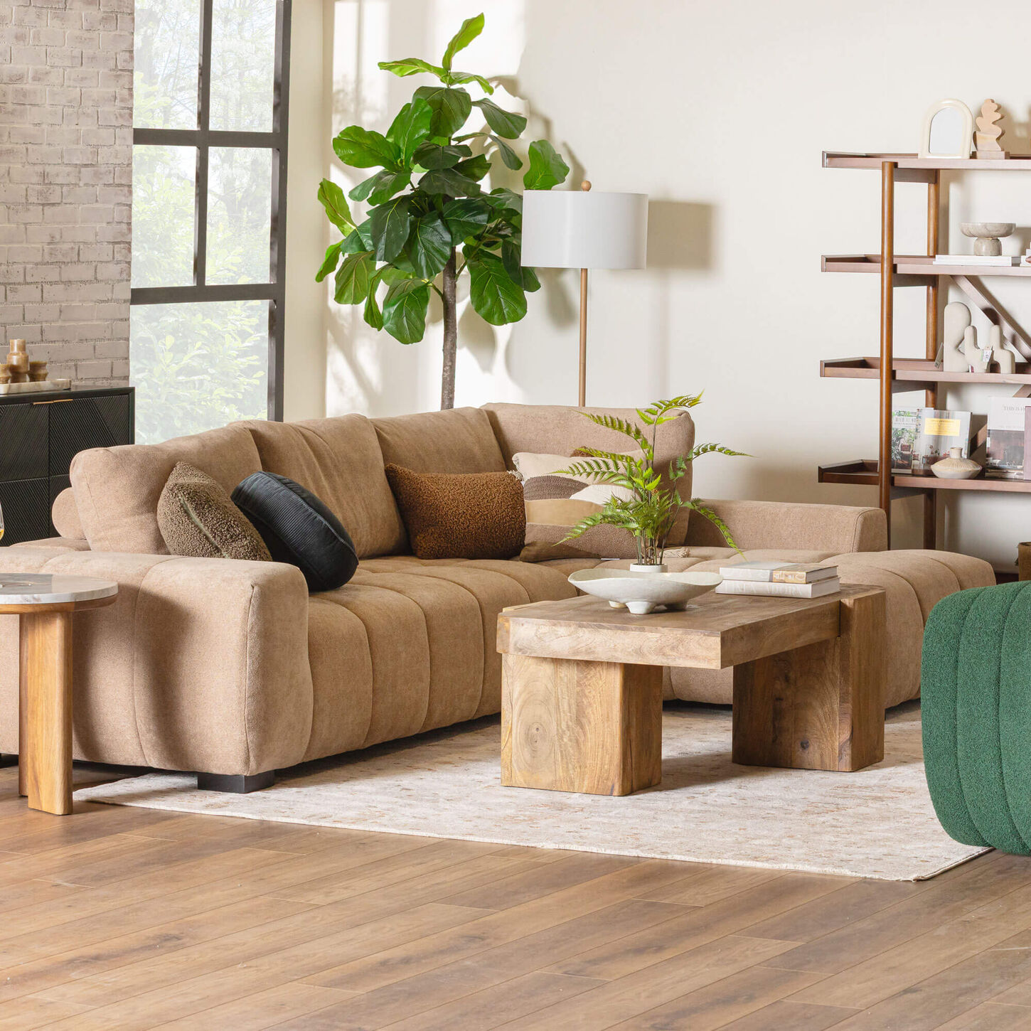Light wood dining set in bright room with tan walls