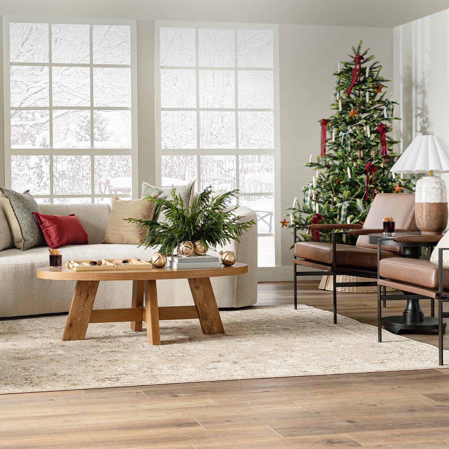 bright holiday living room with 2 leather accent chairs