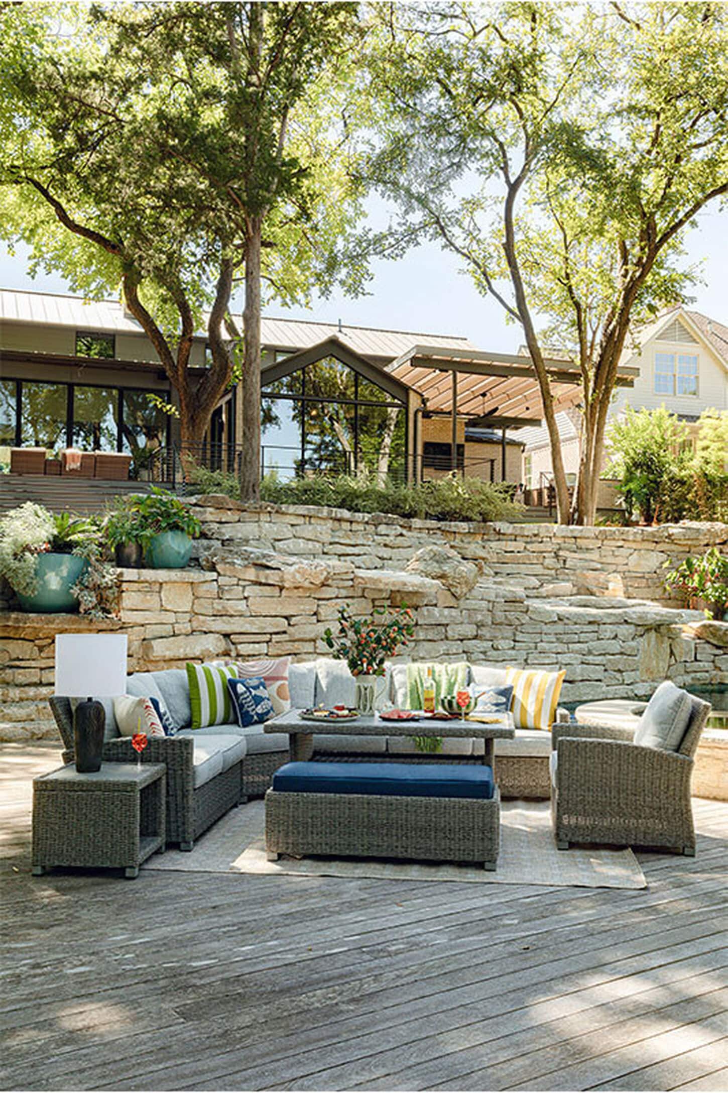 Wicker Outdoor Sectional with a fully prepared dining table