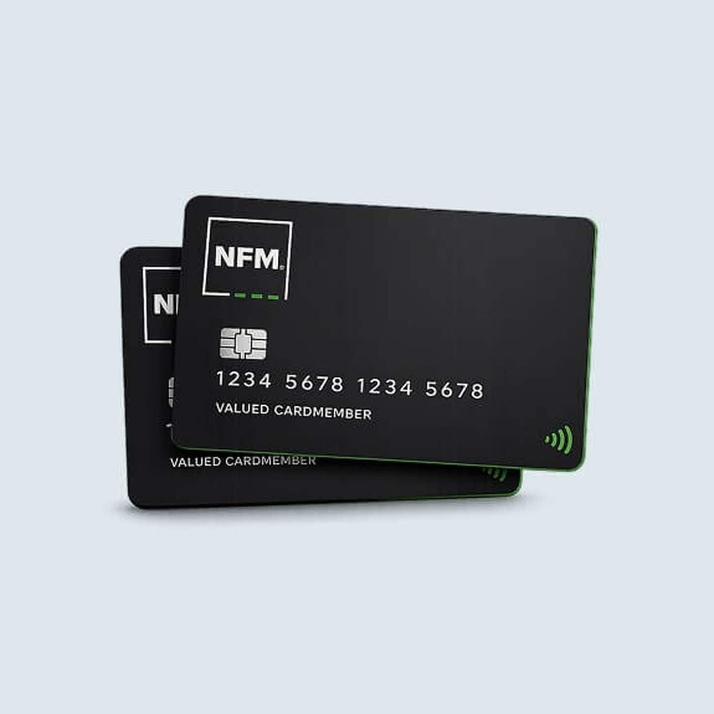 Two NFM credit cards with one overlaid on top of the other