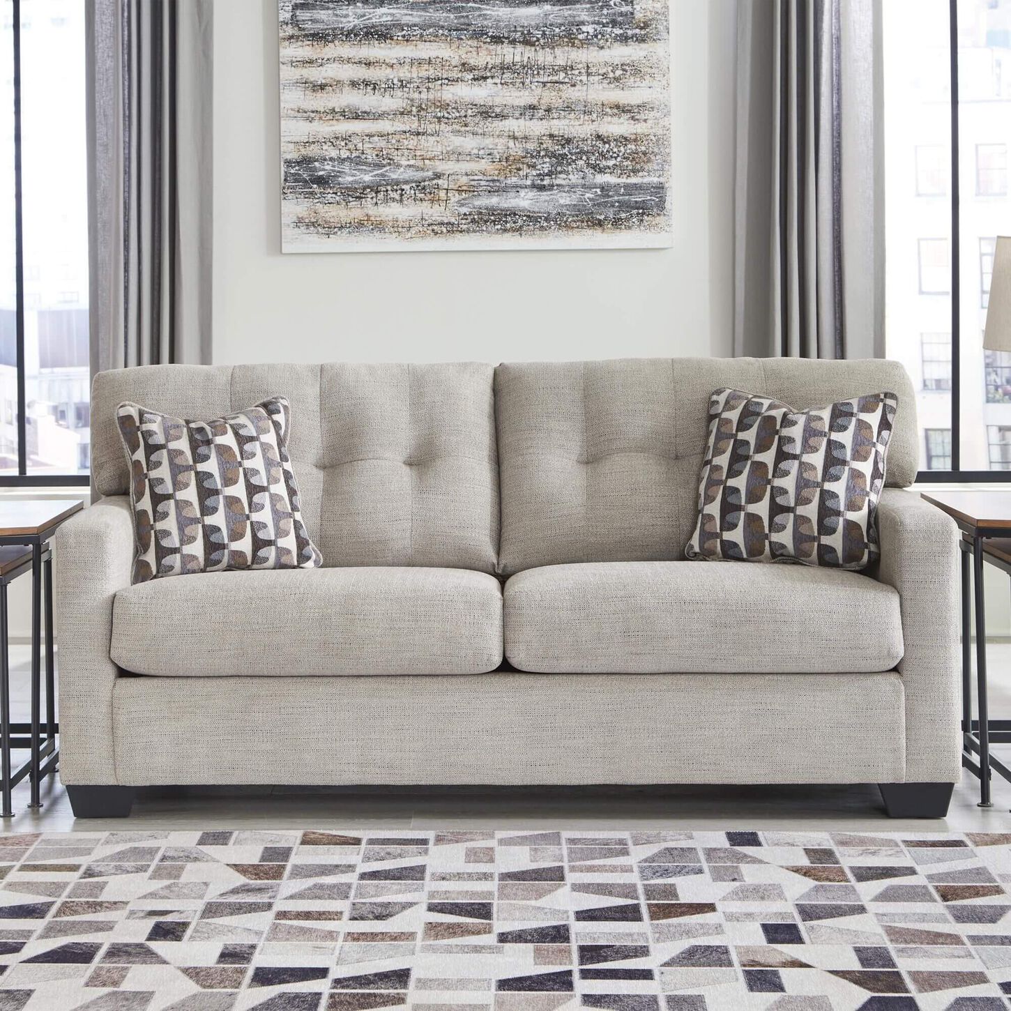 Ashley Mahoney Stationary Sofa in Pebble in a tidy room