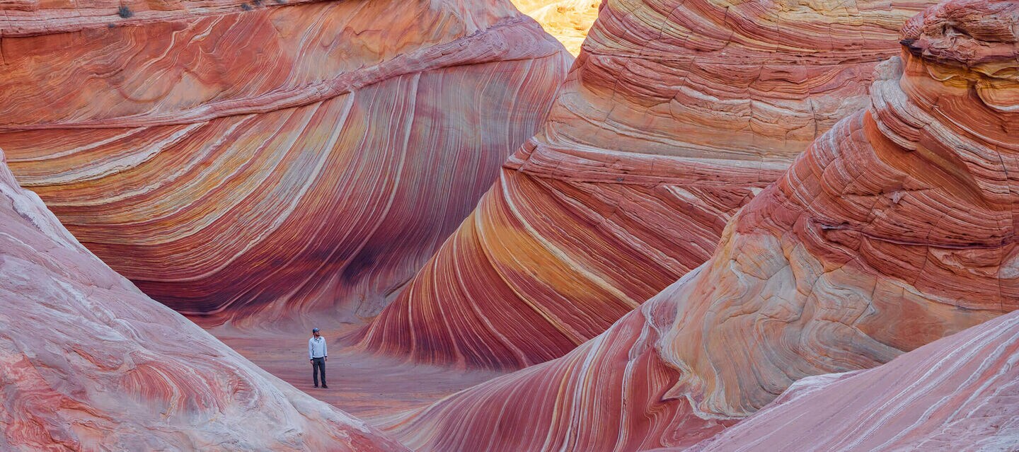 Man in a rock canyon