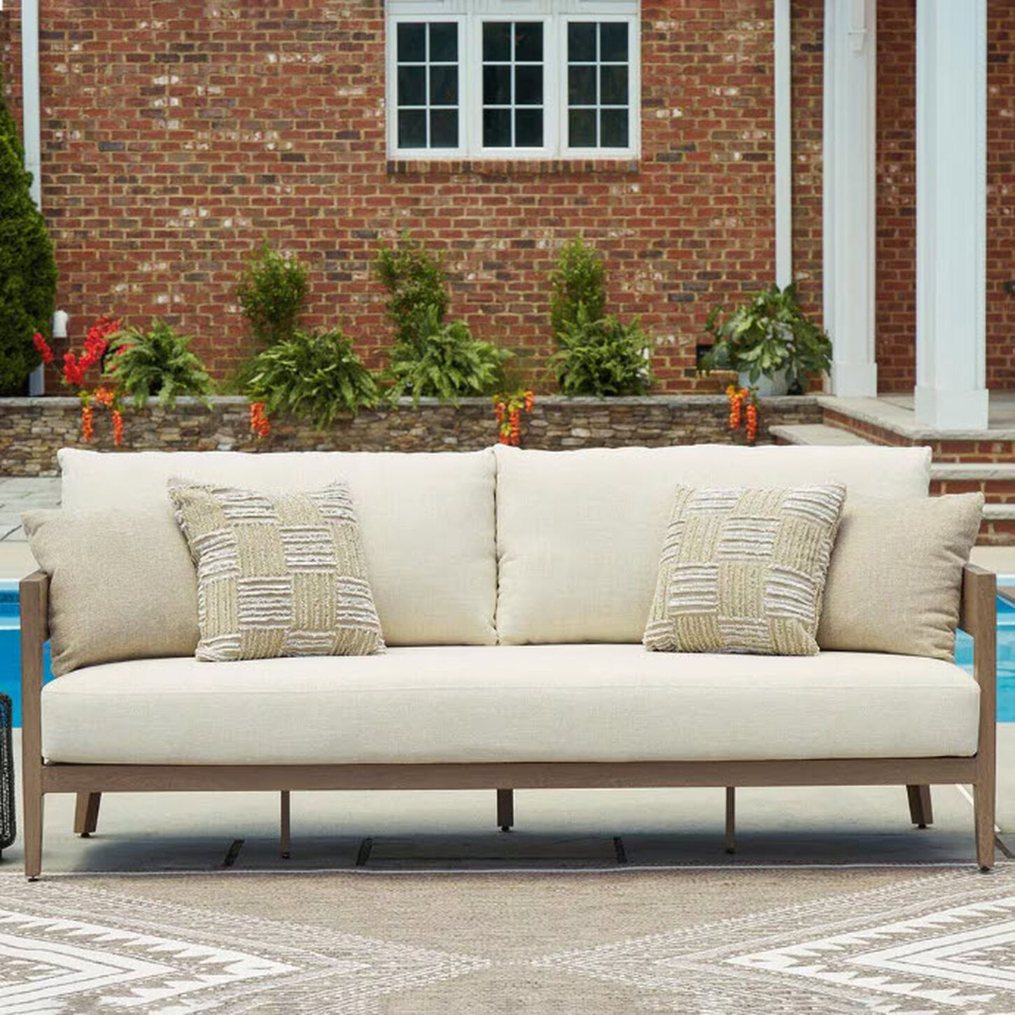 Ashley Serene Bay Patio Sofa in White