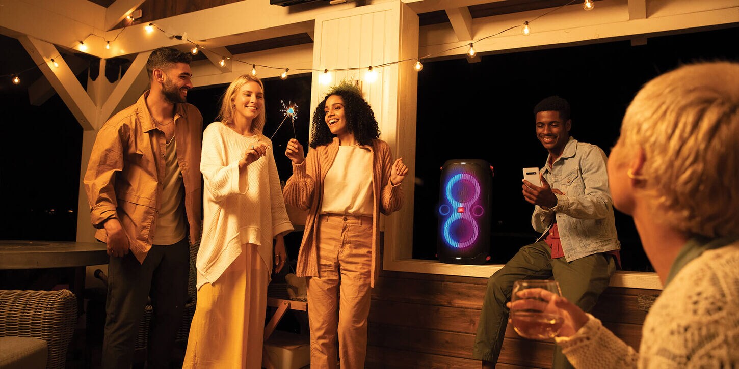 outdoor party with people and party speaker by JLB