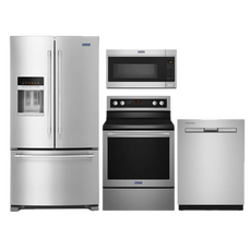 Stainless steel refrigerator, microwave, range, and dishwasher