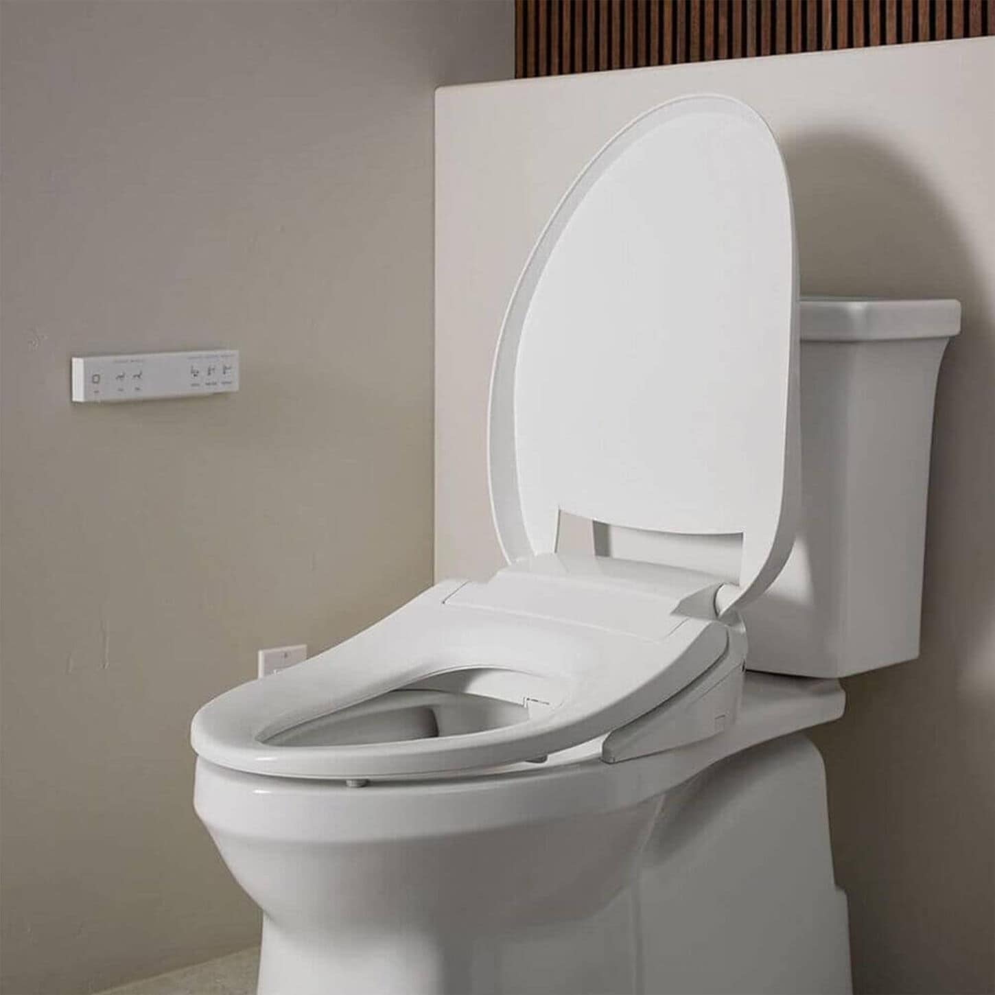 Kohler PureWash E725 Elongated Bidet Toilet Seat with Remote Control in Biscuit