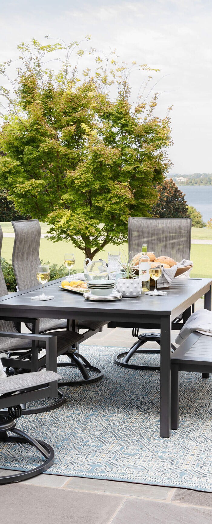Five piece metal dining set with a bench as a seating option