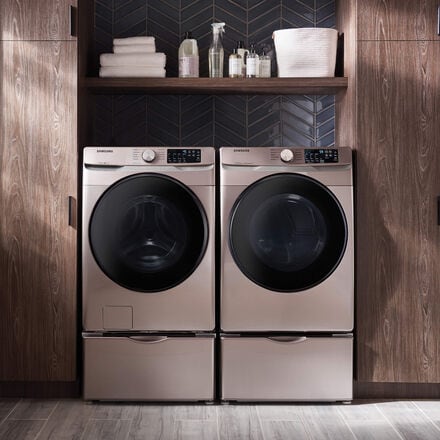 Rose gold laundry pair in an upscale mud room