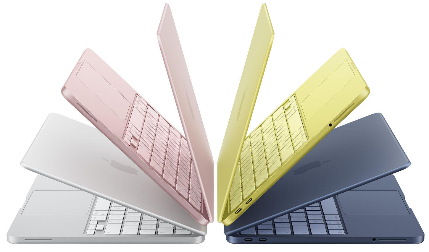 Two Apple MacBook Pros open facing opposite directions