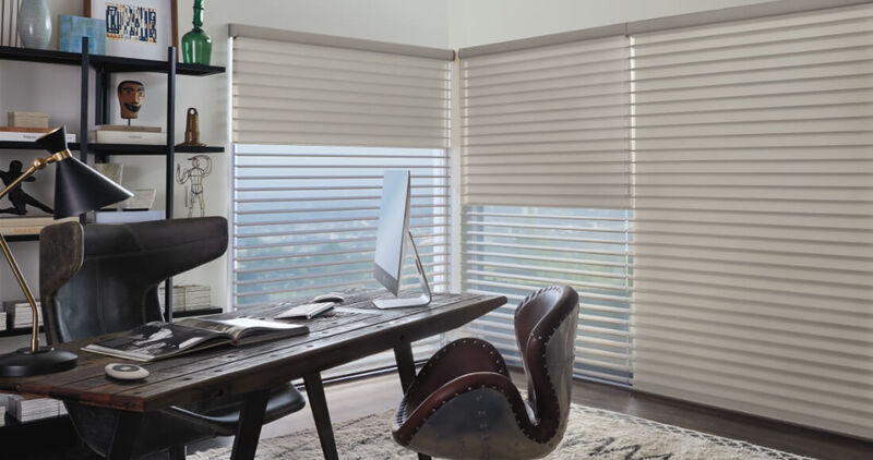 Home office with installed white, modern floor to ceiling blinds