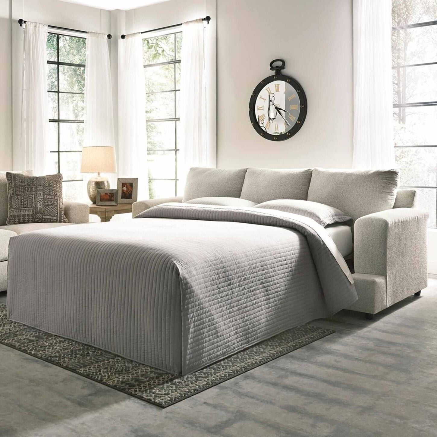 light gray sofa sleeper in a living room