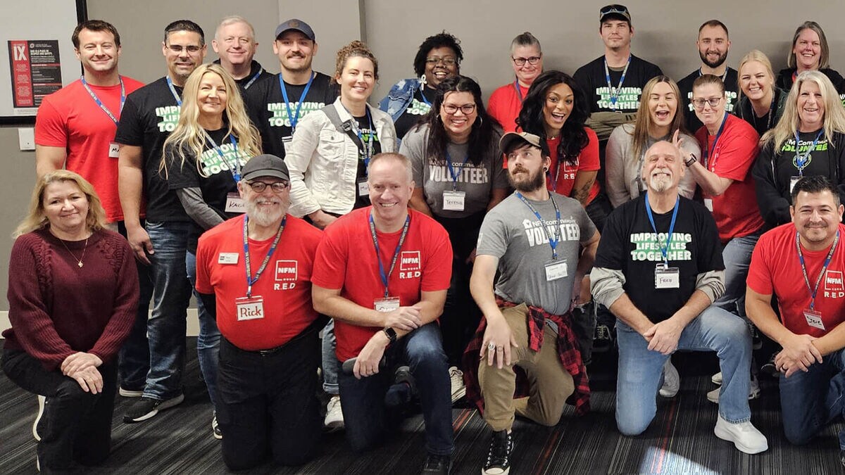 NFM employees gathered together before volunteering at Joy Meadows