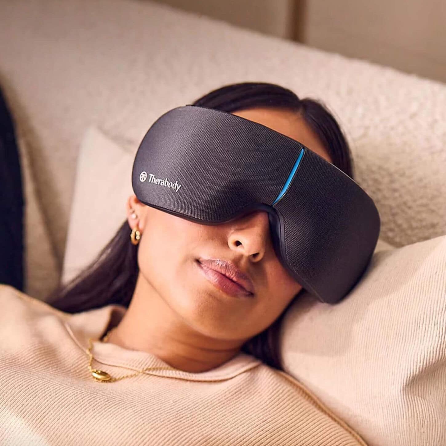 Person wearing Therebody Smart Goggles