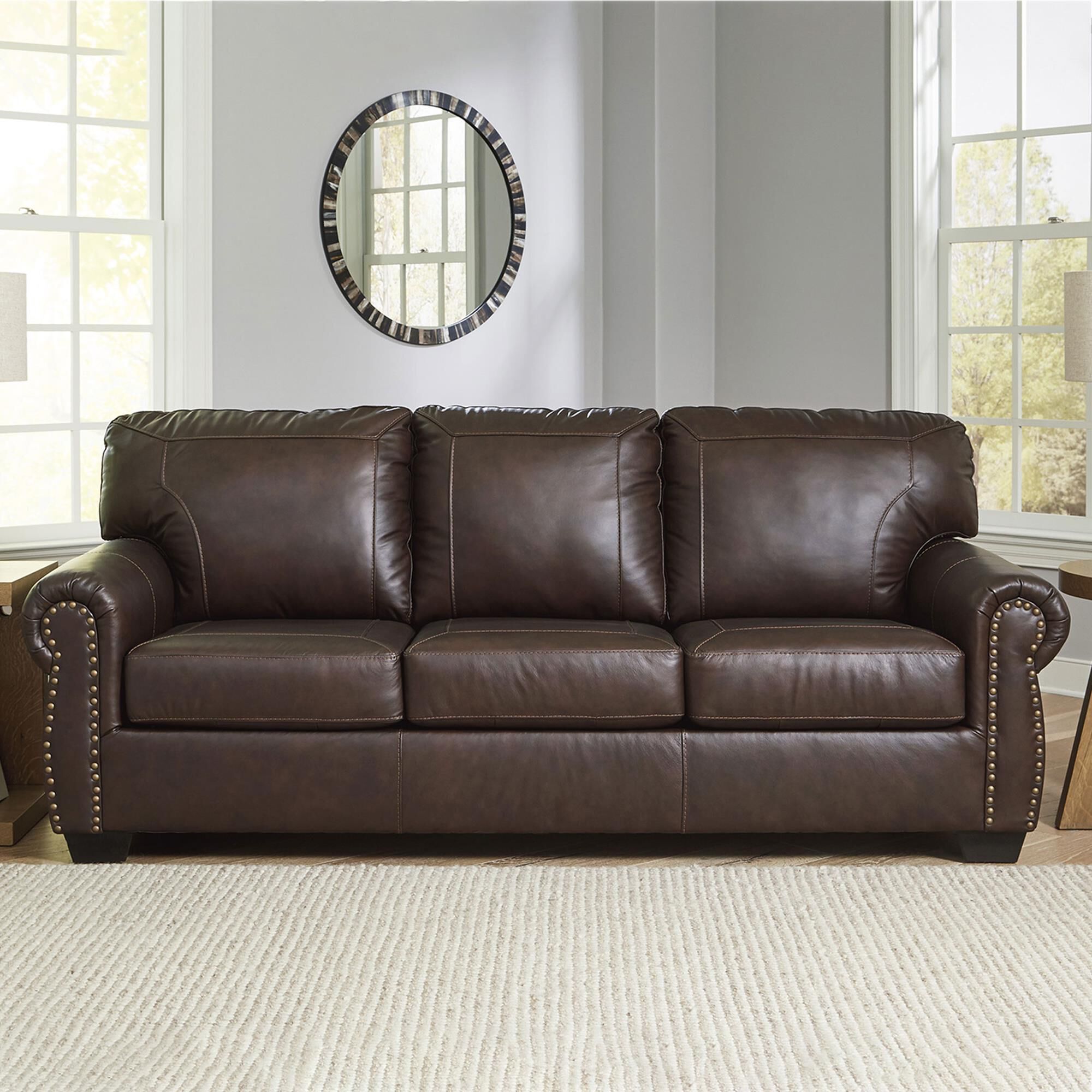 Ashley brown leather new arrivals couch