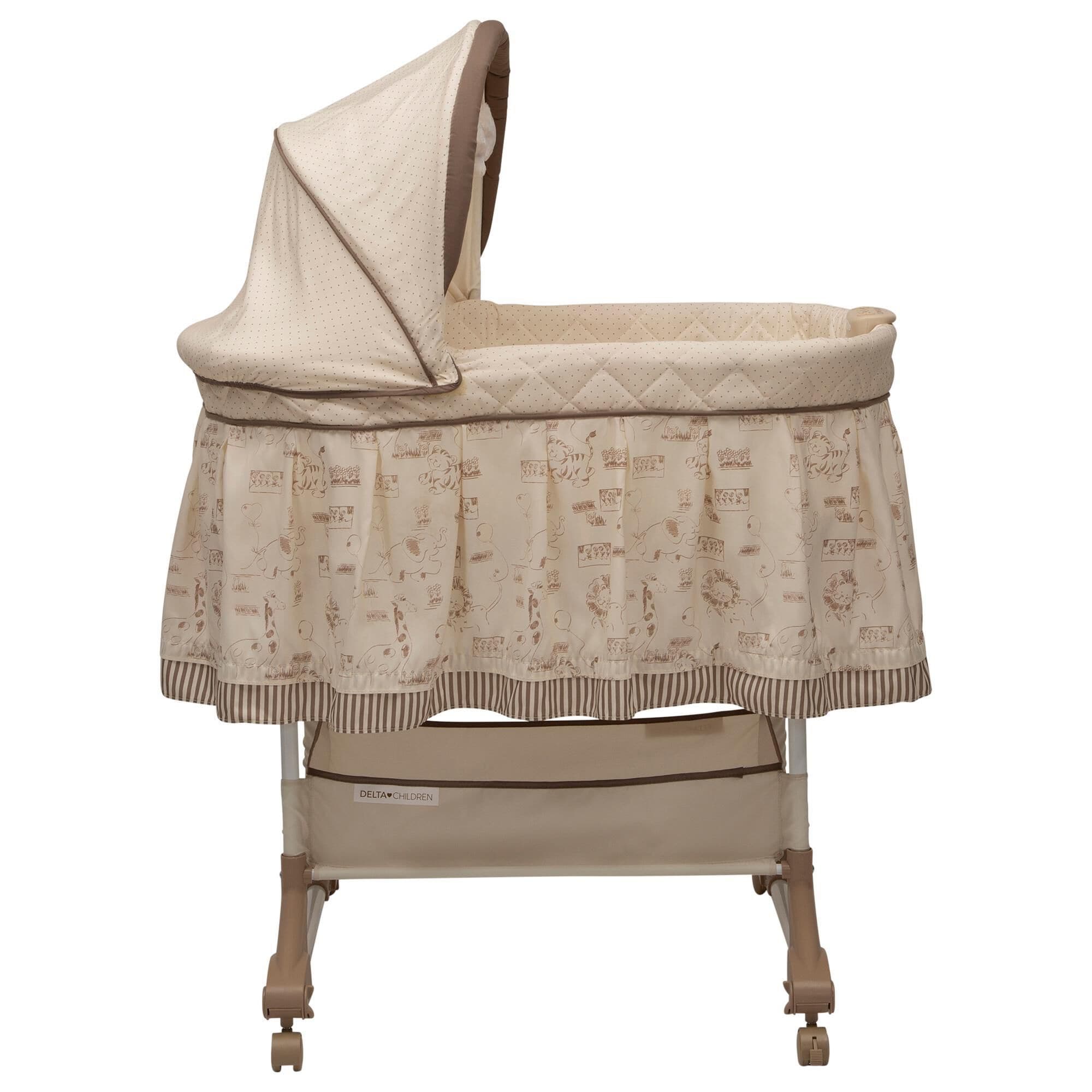 Rocking bassinet with wheels on sale