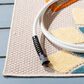 Safavieh Cabana CBN328A 2"2" x 7" Ivory and Orange Indoor/Outdoor Area Performance Rug, , large
