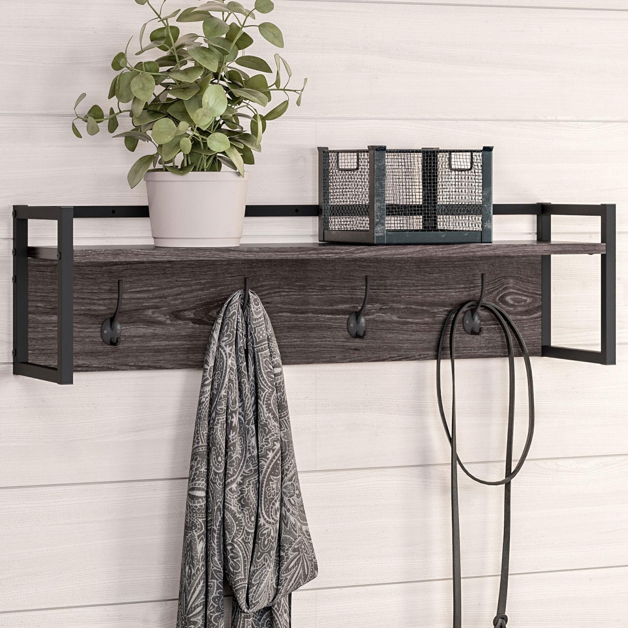 Grey wall clearance shelf with hooks
