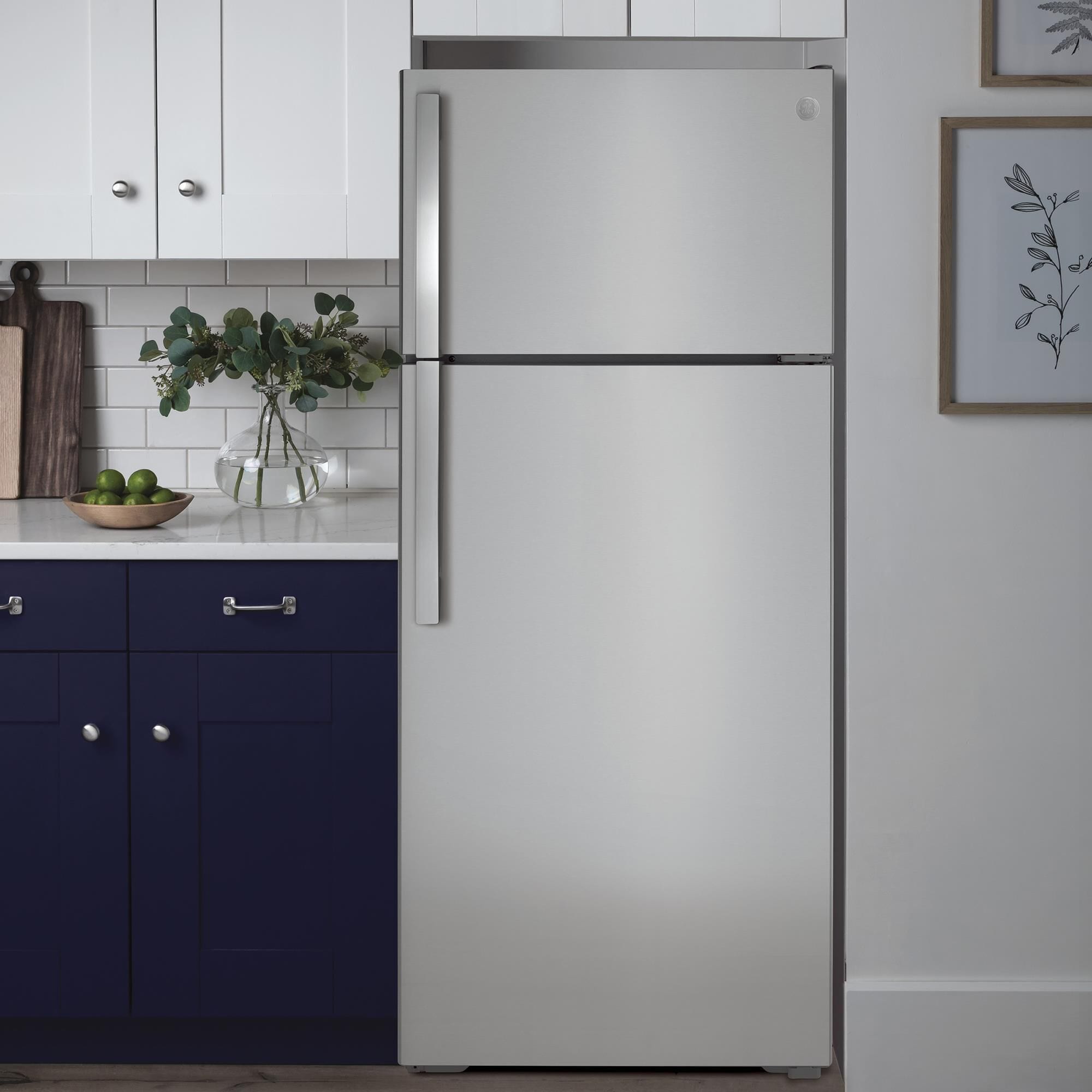 GE Appliances 17.5 Cu. Ft. Top Freezer Refrigerator with Reversible Door in Stainless Steel NFM