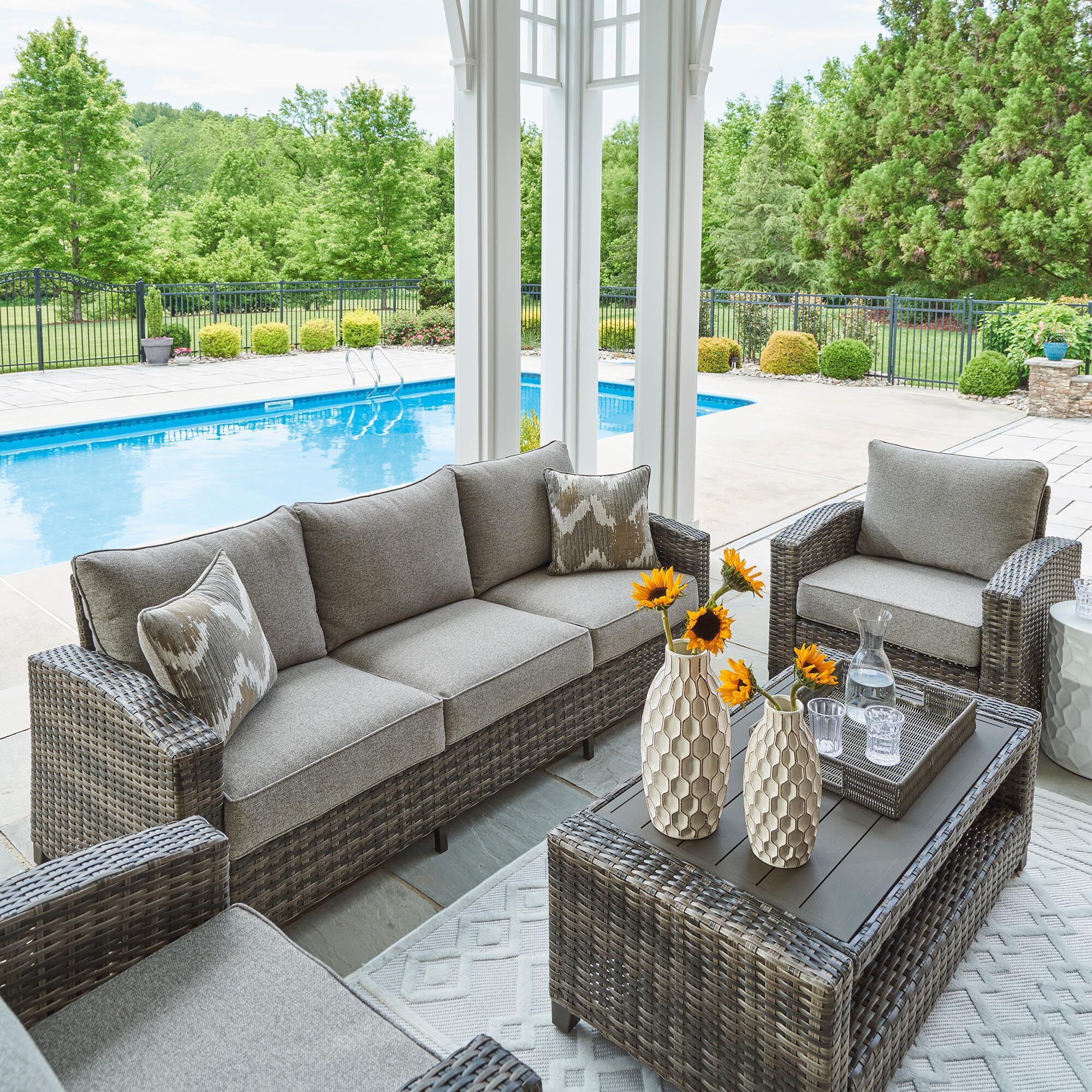 Signature Design by Ashley Oasis Court 4 Piece Patio Conversation Set in Gray NFM
