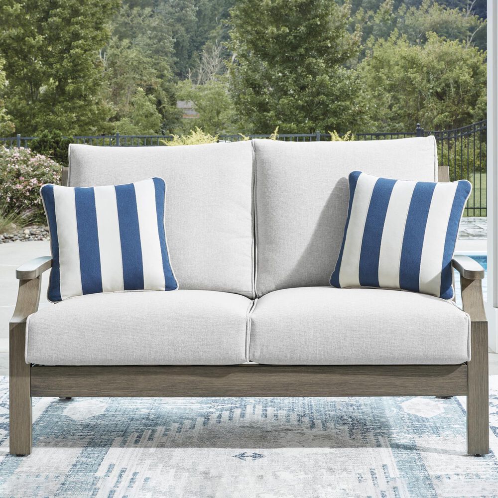 Ashley Rainier Ranch Outdoor Loveseat with Beige Cushion in Brown, , large