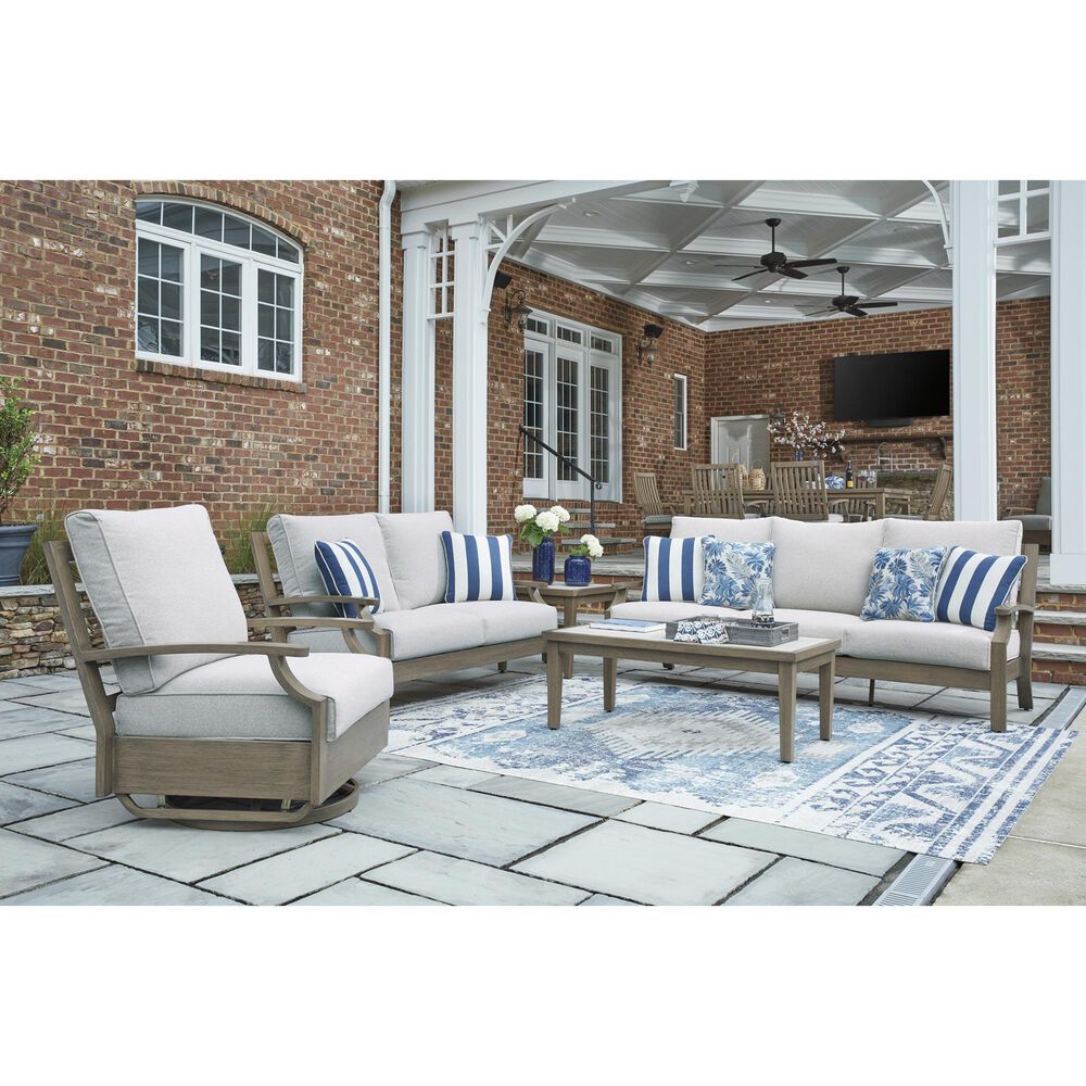 Ashley Rainier Ranch Patio Rectangular Cocktail Table in Brown and Beige, , large