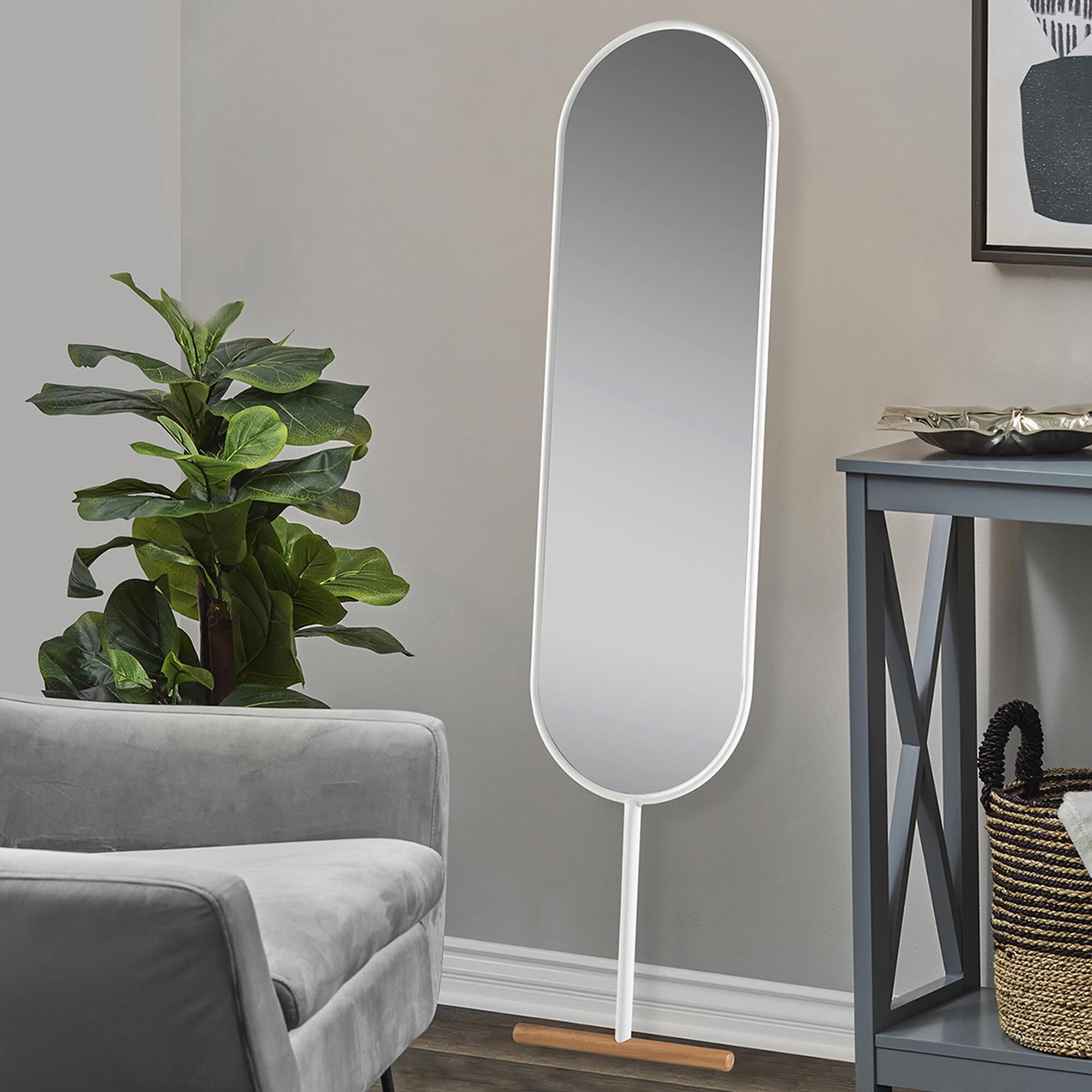 White leaning shop mirror