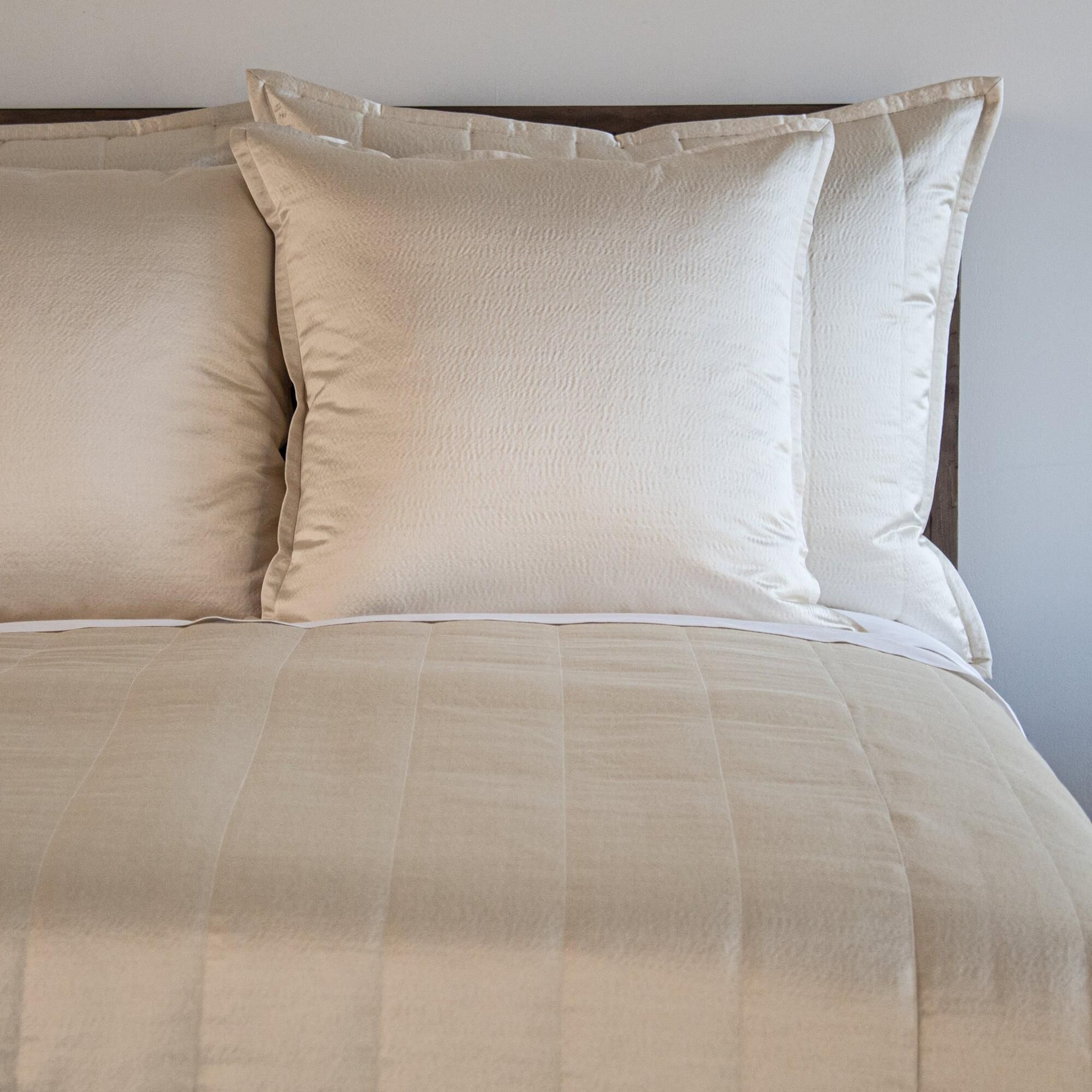 Champagne quilted throw deals