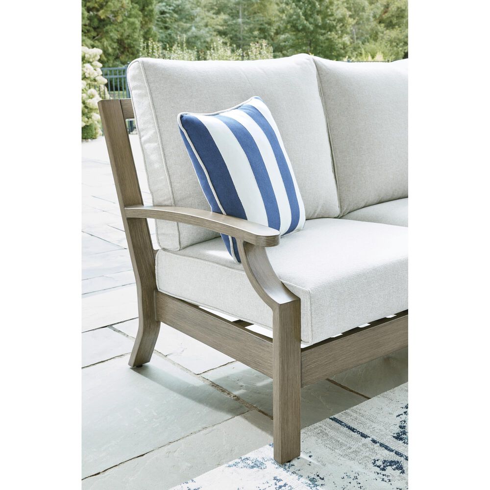 Ashley Rainier Ranch Outdoor Loveseat with Beige Cushion in Brown, , large