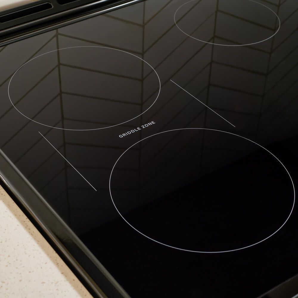 Whirlpool 2-Piece Kitchen Package with 6.4 Cu. Ft. Induction Range and 1.1 Cu. Ft. Flush Mount Microwave in Fingerprint Resistant Stainless Steel, , large