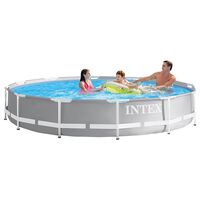 family in outdoor pool