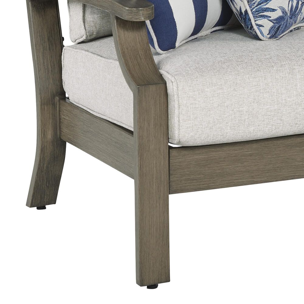 Ashley Rainier Ranch Outdoor Sofa with Beige Cushion in Brown, , large