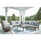 Ashley Rainier Ranch Patio Rectangular Cocktail Table in Brown and Beige, , large