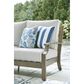 Ashley Rainier Ranch Outdoor Sofa with Beige Cushion in Brown, , large