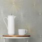 NextWall Starburst Geo 216" x 20.5" Peel and Stick Wallpaper in Silversmoke and Metallic Gold, , large