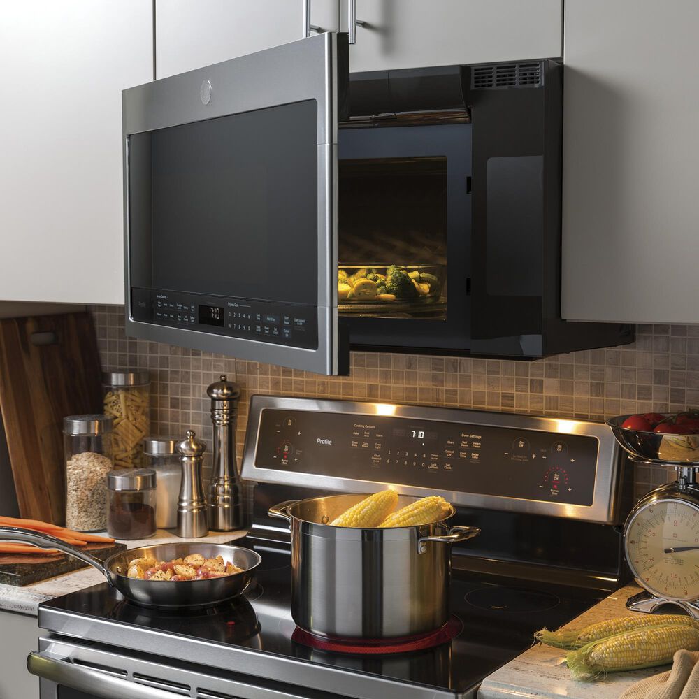 GE Profile 5.3 Cu. Ft. Smart Induction Electric Range and 2.1 Cu. Ft.  Over-the-Range Sensor Microwave Oven in Fingerprint Resistant Stainless  Steel