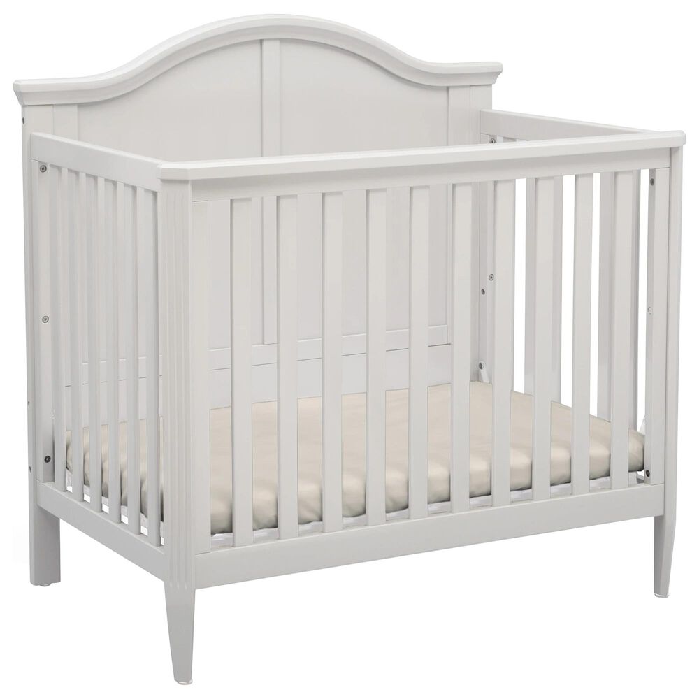 Delta Parker Mini Convertible Baby Crib with Mattress in Bianca White
