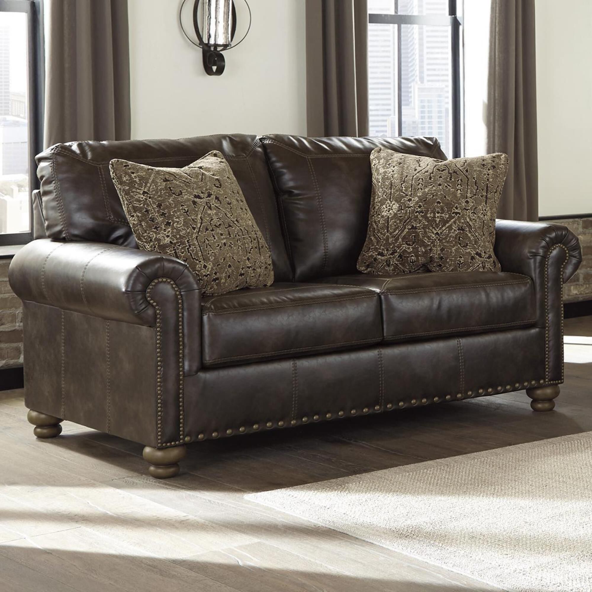 Signature Design by Ashley Nicorvo Loveseat in Coffee Nebraska