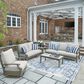 Ashley Rainier Ranch Patio Rectangular Cocktail Table in Brown and Beige, , large