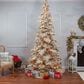 The Gerson Company 9" Pre-Lit Artificial Heavy Flocked Layered Spruce with White Lights in Green, , large