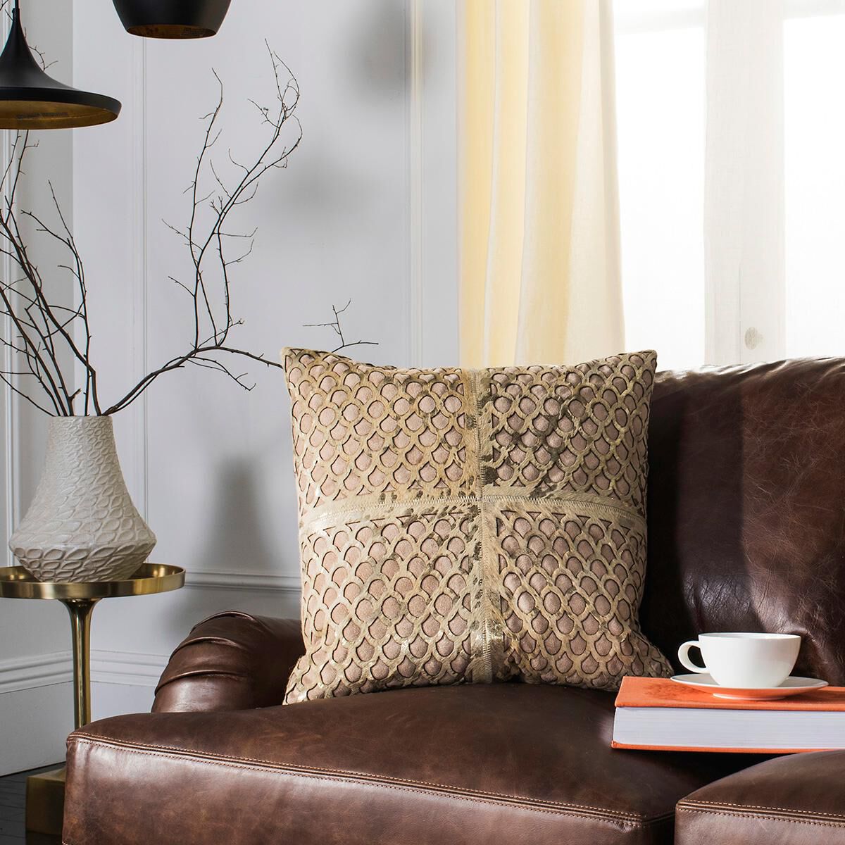 Safavieh cowhide pillows top