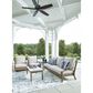 Ashley Rainier Ranch Outdoor Sofa with Beige Cushion in Brown, , large