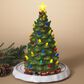 The Gerson Company Electric Lighted Musical Ceramic Christmas Tree with Moving Train in Green, , large