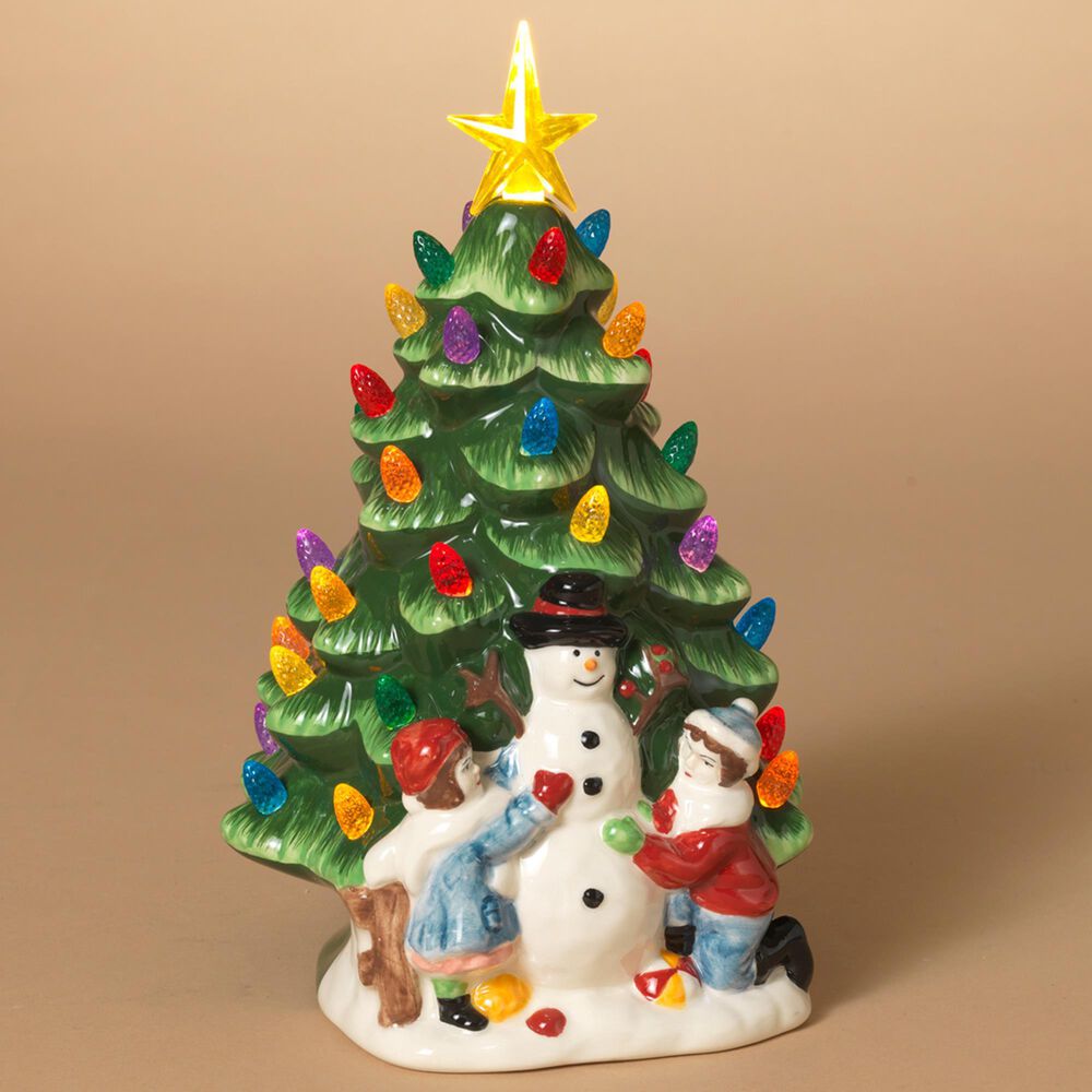 The Gerson Company 10"H Battery-Operated Lighted Ceramic Christmas Tree with Snowman and Children in Assort, , large